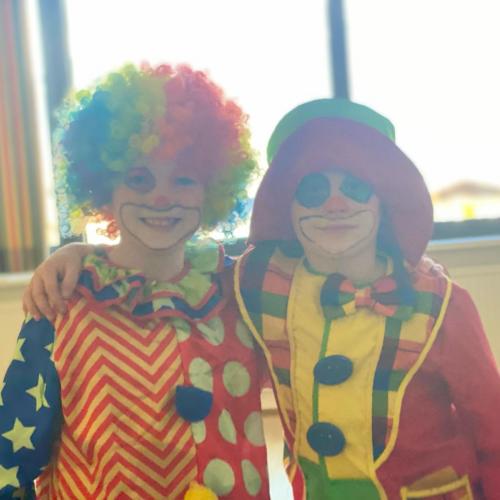 2 Clowns Arm in Arm